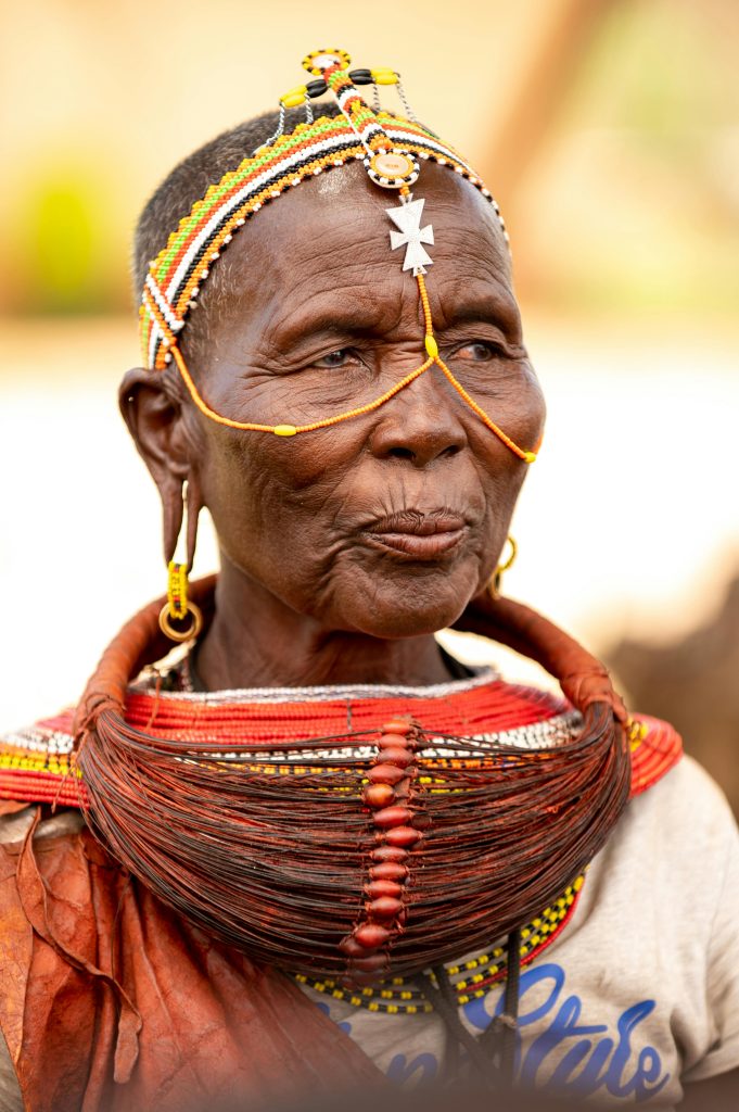 "Traditional Samburu Woman," by Collines Omondi, open copyright at https://www.pexels.com/photo/traditional-samburu-woman-16863348/